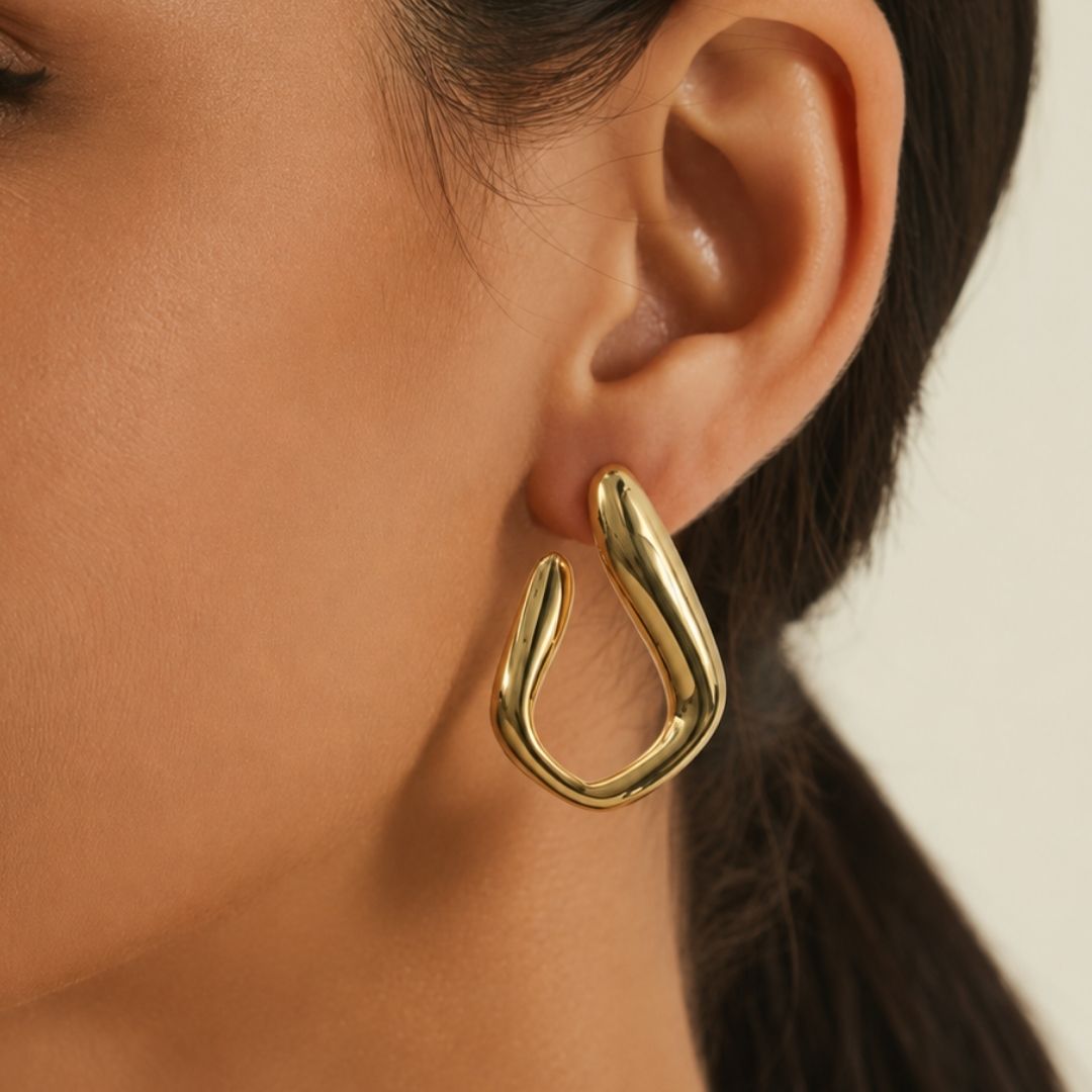 Golden Harmony Twist Hoops